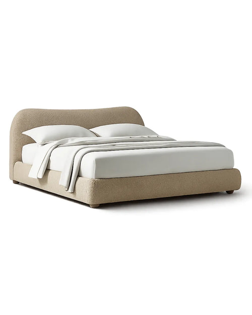 Avyelle Curved Upholstered Camel-Back Sandstone Bed